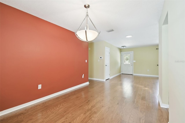 4514 John Moore Rd, Brandon, FL 33511 - spare room featuring baseboards and light wood finished floors