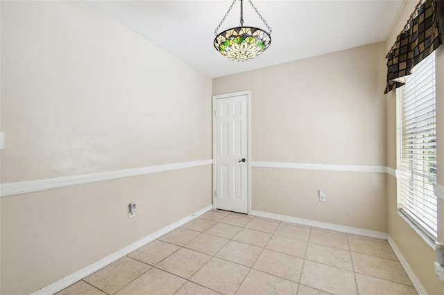 4514 John Moore Rd, Brandon, FL 33511 - unfurnished room featuring baseboards and tile patterned floors