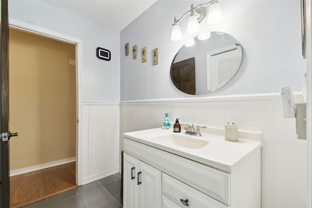 4514 John Moore Rd, Brandon, FL 33511 - bathroom with wainscoting, vanity, and tile patterned flooring