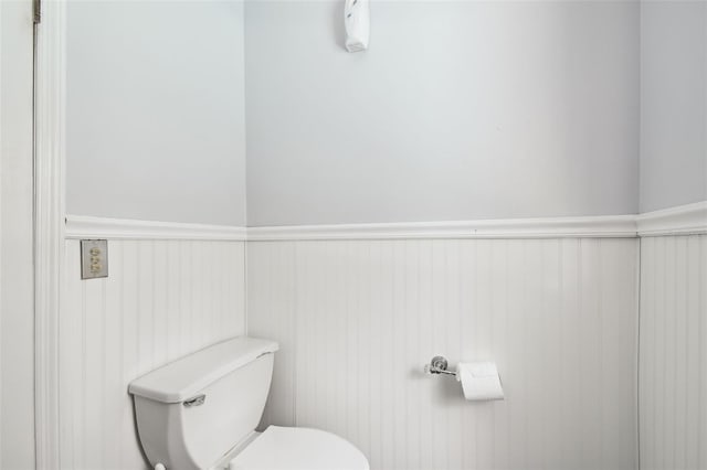 4514 John Moore Rd, Brandon, FL 33511 - bathroom with wainscoting and toilet