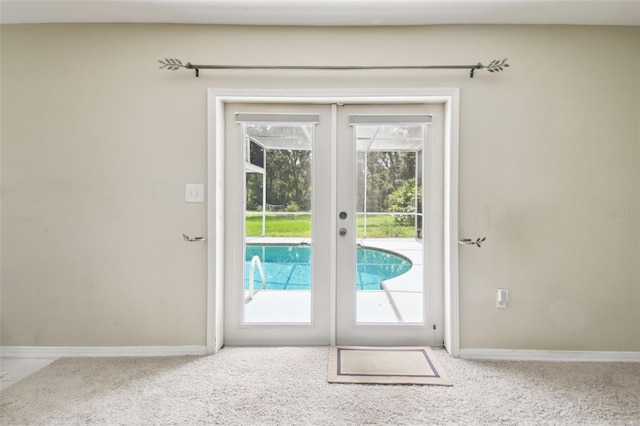 4514 John Moore Rd, Brandon, FL 33511 - doorway to outside featuring french doors and carpet