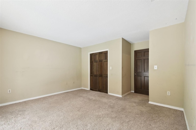 4514 John Moore Rd, Brandon, FL 33511 - unfurnished bedroom with light carpet and a closet