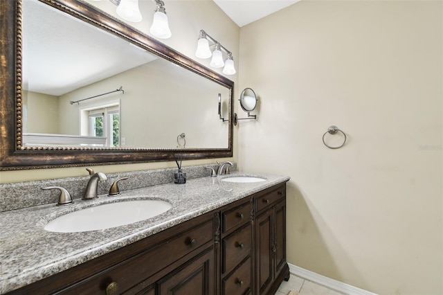 4514 John Moore Rd, Brandon, FL 33511 - bathroom with double vanity and tile patterned flooring