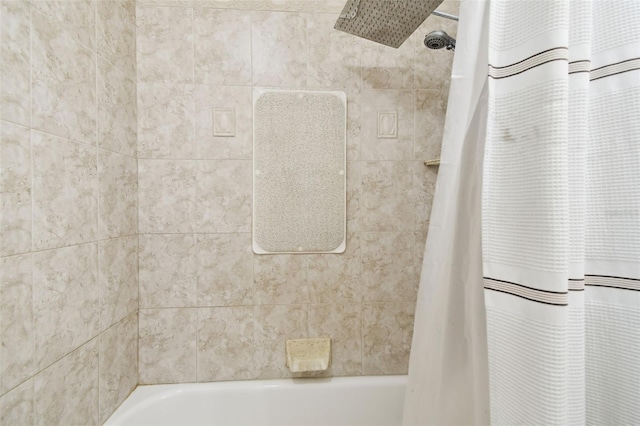 4514 John Moore Rd, Brandon, FL 33511 - bathroom with shower / bathtub combination with curtain