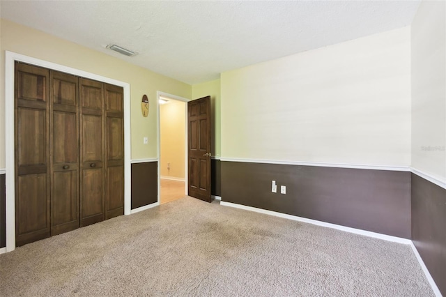 4514 John Moore Rd, Brandon, FL 33511 - unfurnished bedroom featuring carpet floors and a closet