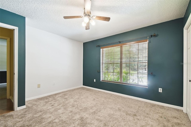 4514 John Moore Rd, Brandon, FL 33511 - empty room with carpet flooring, a textured ceiling, and a ceiling fan
