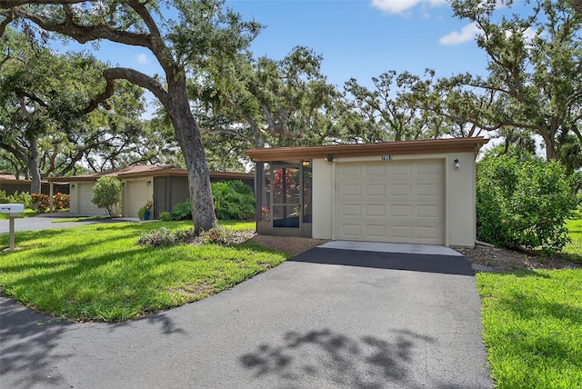7051 Bright Creek Dr Unit 6, Sarasota, FL 34231 - view of front of home with driveway and a front yard