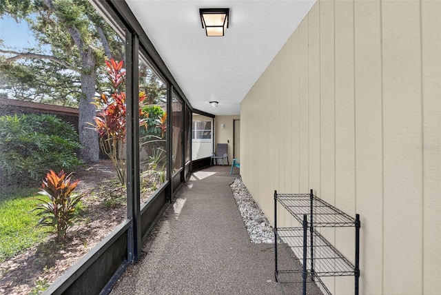 7051 Bright Creek Dr Unit 6, Sarasota, FL 34231 - unfurnished sunroom featuring healthy amount of natural light