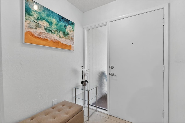 7051 Bright Creek Dr Unit 6, Sarasota, FL 34231 - entryway featuring light tile patterned flooring