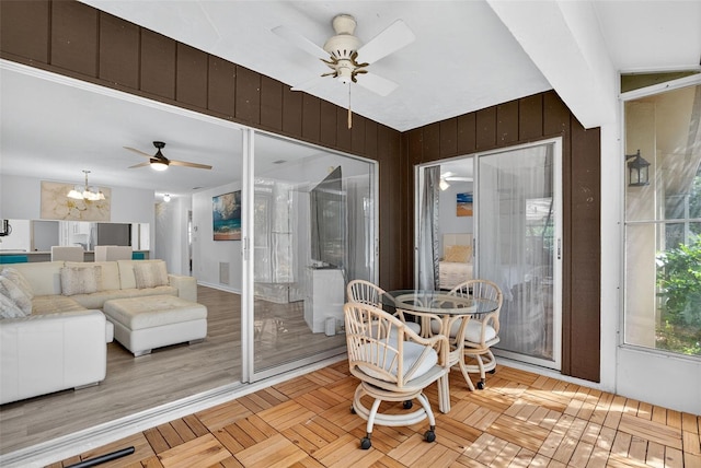 7051 Bright Creek Dr Unit 6, Sarasota, FL 34231 - sunroom with a chandelier