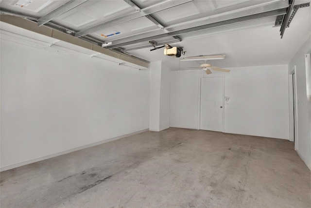 7051 Bright Creek Dr Unit 6, Sarasota, FL 34231 - garage with a garage door opener and ceiling fan