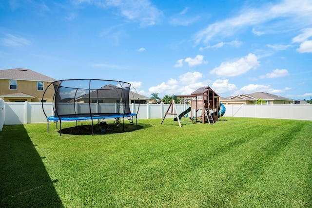 15206 Trinity Fall Way, Bradenton, FL 34212 - fenced backyard with a trampoline and a playground