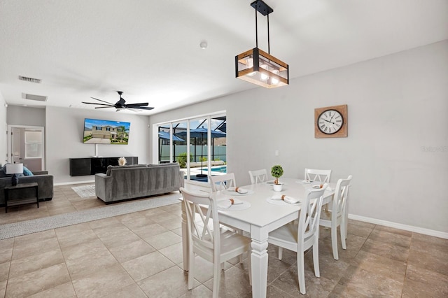15206 Trinity Fall Way, Bradenton, FL 34212 - dining space featuring ceiling fan and light tile patterned floors