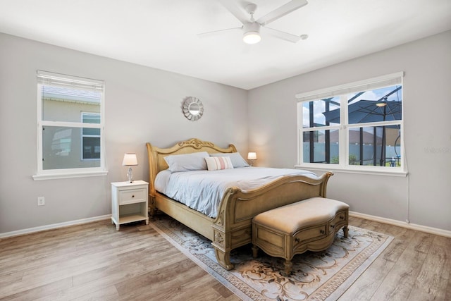 15206 Trinity Fall Way, Bradenton, FL 34212 - bedroom featuring light wood-style floors and ceiling fan