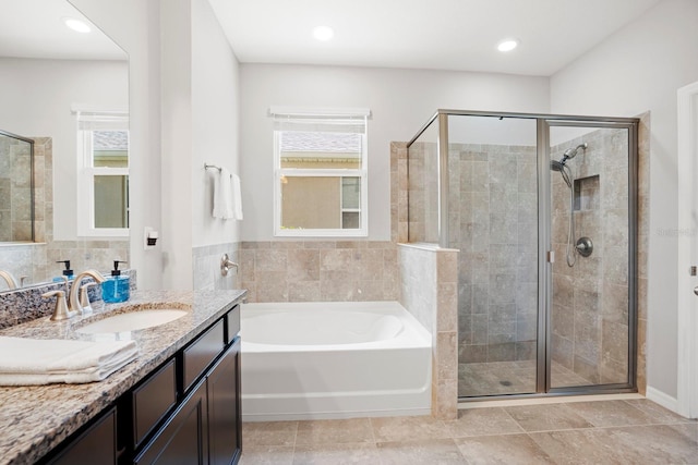 15206 Trinity Fall Way, Bradenton, FL 34212 - full bath featuring a bath, vanity, and a shower stall