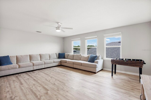 15206 Trinity Fall Way, Bradenton, FL 34212 - living area with light wood-type flooring and a ceiling fan