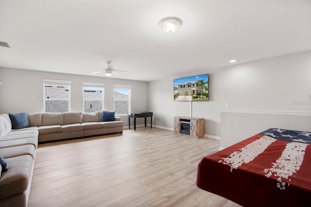 15206 Trinity Fall Way, Bradenton, FL 34212 - living area featuring wood finished floors and ceiling fan