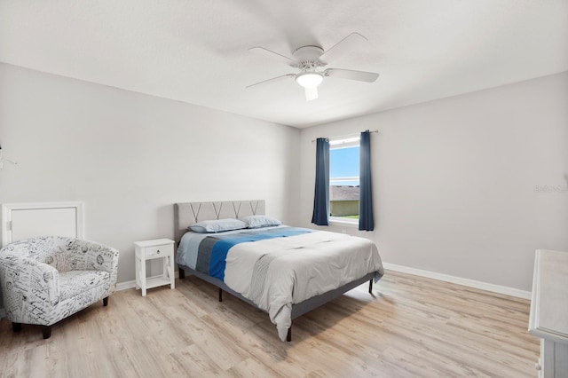 15206 Trinity Fall Way, Bradenton, FL 34212 - bedroom featuring light wood-style floors and a ceiling fan