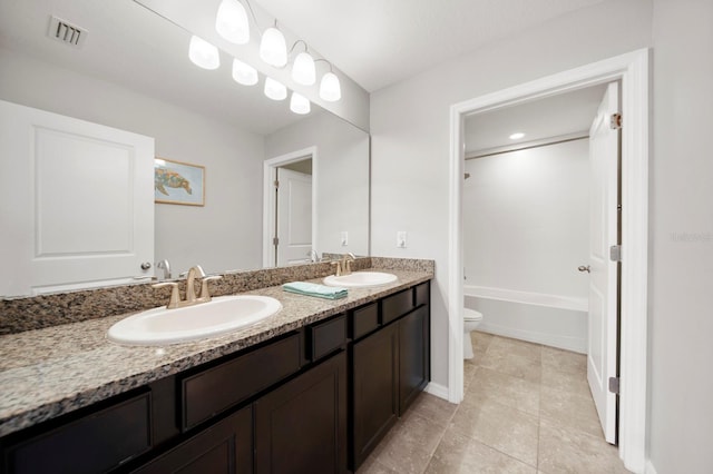 15206 Trinity Fall Way, Bradenton, FL 34212 - full bathroom with double vanity, bathtub / shower combination, and tile patterned floors