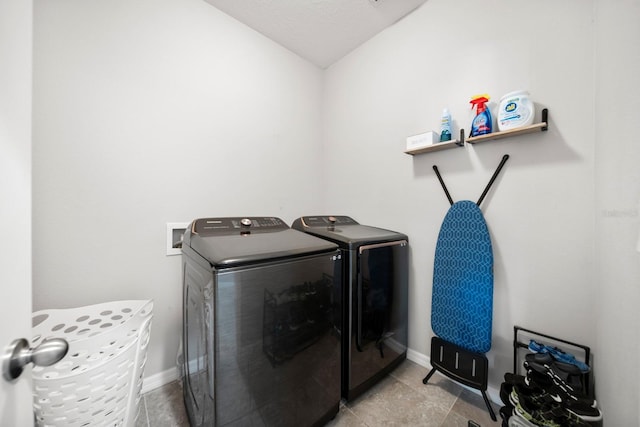 15206 Trinity Fall Way, Bradenton, FL 34212 - laundry room with washer and clothes dryer and baseboards