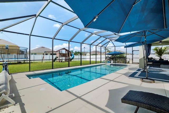 15206 Trinity Fall Way, Bradenton, FL 34212 - view of pool featuring a patio area, a playground, glass enclosure, and a trampoline