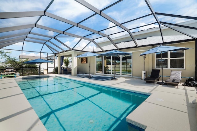 15206 Trinity Fall Way, Bradenton, FL 34212 - outdoor pool with a patio area and glass enclosure