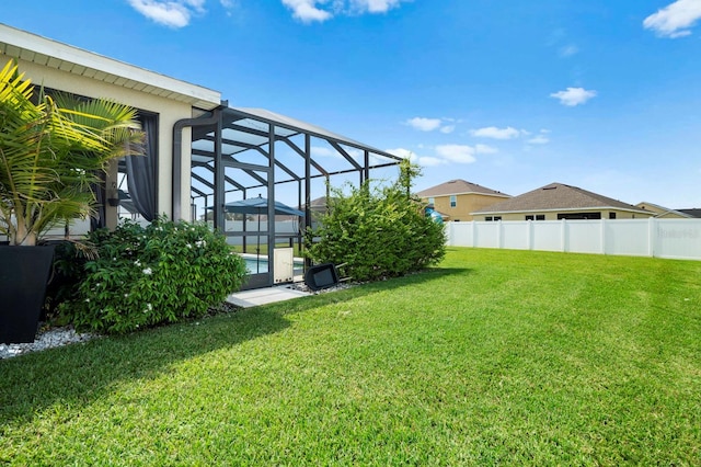 15206 Trinity Fall Way, Bradenton, FL 34212 - view of yard with glass enclosure and an outdoor pool