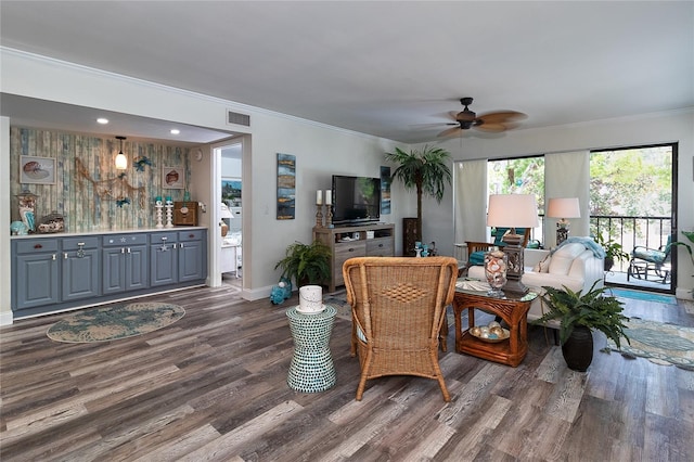 700 Starkey Rd Unit 1124, Largo, FL 33771 - living room with wood finished floors, ceiling fan, and crown molding