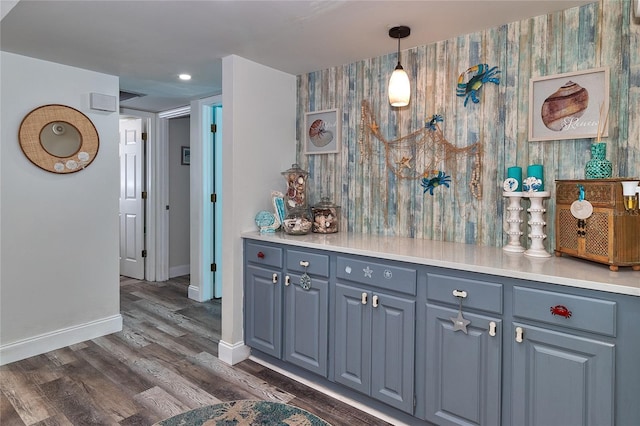 700 Starkey Rd Unit 1124, Largo, FL 33771 - bar area with dark wood-type flooring, recessed lighting, and hanging light fixtures