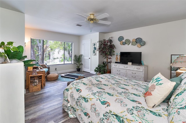 700 Starkey Rd Unit 1124, Largo, FL 33771 - bedroom with wood finished floors and a ceiling fan