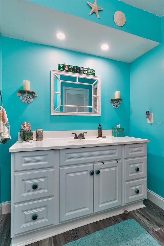700 Starkey Rd Unit 1124, Largo, FL 33771 - bathroom with vanity and wood finished floors