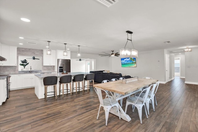 6000 115th Ln, Seminole, FL 33772 - dining space featuring dark wood finished floors, recessed lighting, and ceiling fan