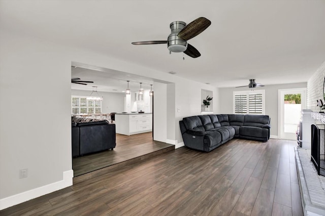 6000 115th Ln, Seminole, FL 33772 - living area with ceiling fan, dark wood finished floors, and plenty of natural light