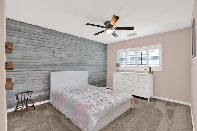 6000 115th Ln, Seminole, FL 33772 - bedroom featuring an accent wall, carpet, and ceiling fan