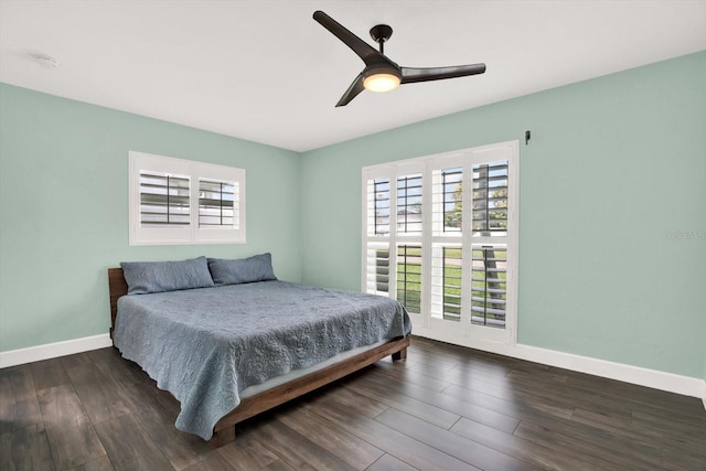 6000 115th Ln, Seminole, FL 33772 - bedroom featuring multiple windows, wood finished floors, and ceiling fan