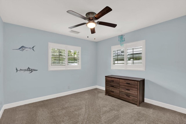6000 115th Ln, Seminole, FL 33772 - carpeted spare room with ceiling fan and baseboards