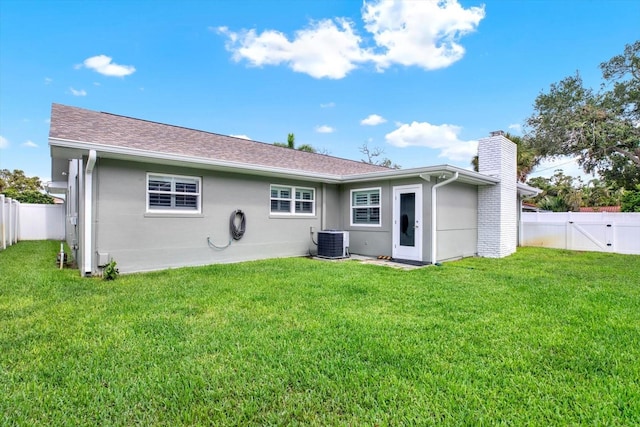 6000 115th Ln, Seminole, FL 33772 - rear view of property featuring a chimney, a fenced backyard, stucco siding, and a gate