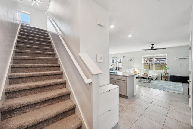 16051 Soft Fern Trce, Odessa, FL 33556 - staircase featuring a ceiling fan, tile patterned flooring, and recessed lighting