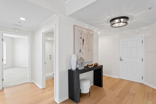 371 Channelside Walk Way Unit 1104, Tampa, FL 33602 - hallway with light wood-style flooring and crown molding