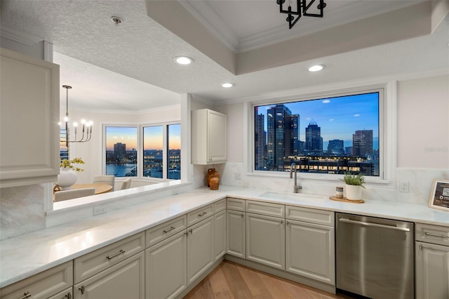 371 Channelside Walk Way Unit 1104, Tampa, FL 33602 - kitchen with dishwasher, a chandelier, ornamental molding, a view of skyline, and light wood-type flooring