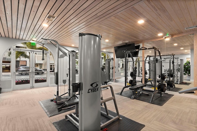 371 Channelside Walk Way Unit 1104, Tampa, FL 33602 - gym featuring carpet floors, wood ceiling, arched walkways, and recessed lighting