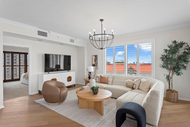 371 Channelside Walk Way Unit 1104, Tampa, FL 33602 - living area with wood finished floors, plenty of natural light, a chandelier, and ornamental molding