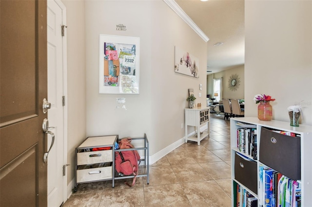 6934 Old Benton Dr, Apollo Beach, FL 33572 - hallway with ornamental molding and light tile patterned floors