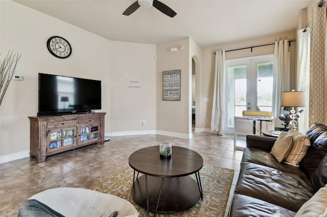 6934 Old Benton Dr, Apollo Beach, FL 33572 - living area featuring ceiling fan, arched walkways, and french doors