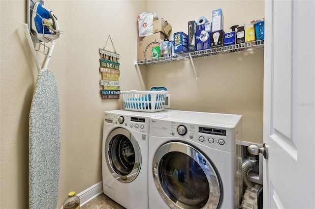 6934 Old Benton Dr, Apollo Beach, FL 33572 - washroom with washer and dryer and baseboards