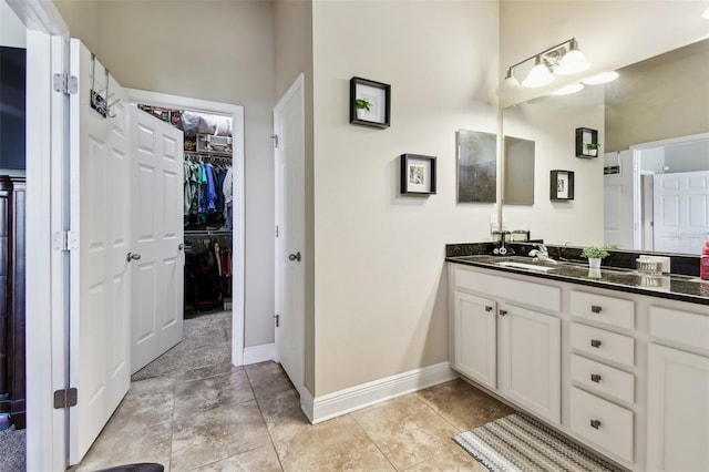 6934 Old Benton Dr, Apollo Beach, FL 33572 - full bath with vanity and a spacious closet