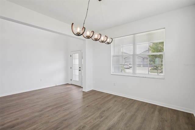 33157 Rosewood Bark Way, Wesley Chapel, FL 33545 - unfurnished room with dark wood-type flooring