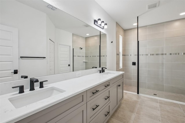 33157 Rosewood Bark Way, Wesley Chapel, FL 33545 - full bath with double vanity, tiled shower, tile patterned floors, and recessed lighting