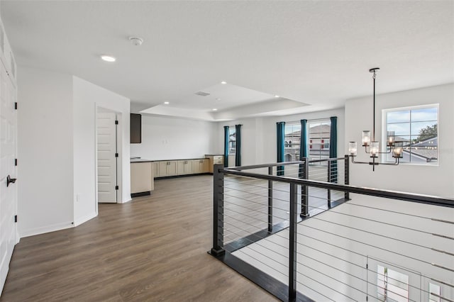 33157 Rosewood Bark Way, Wesley Chapel, FL 33545 - hall with a chandelier, wood finished floors, recessed lighting, and an upstairs landing