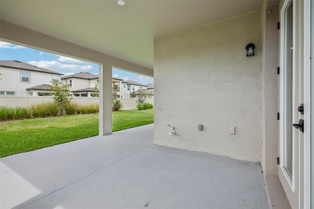 33157 Rosewood Bark Way, Wesley Chapel, FL 33545 - view of patio featuring a residential view